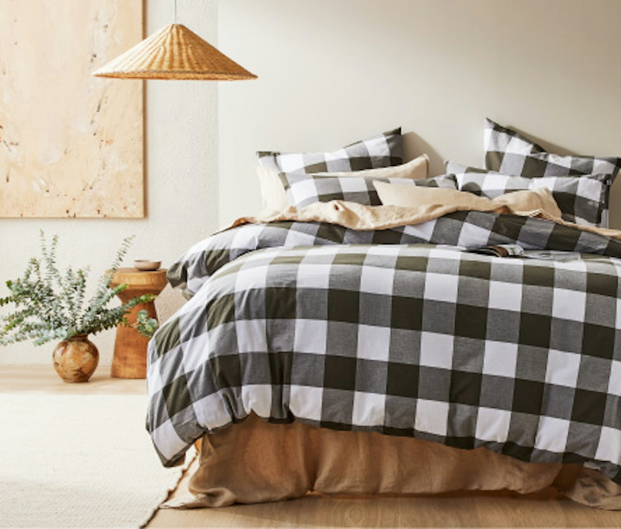 Checkered quilt cover on bed