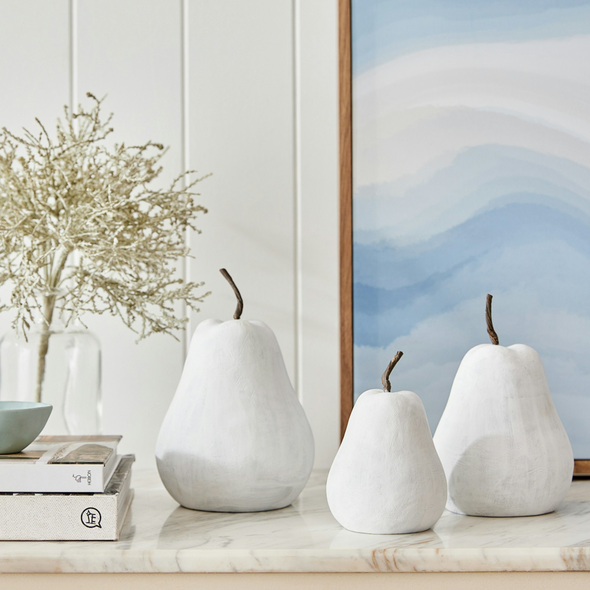 Home with Deborah Hutton SS23 collection. Set of 3 Cement Pears on hallway table.