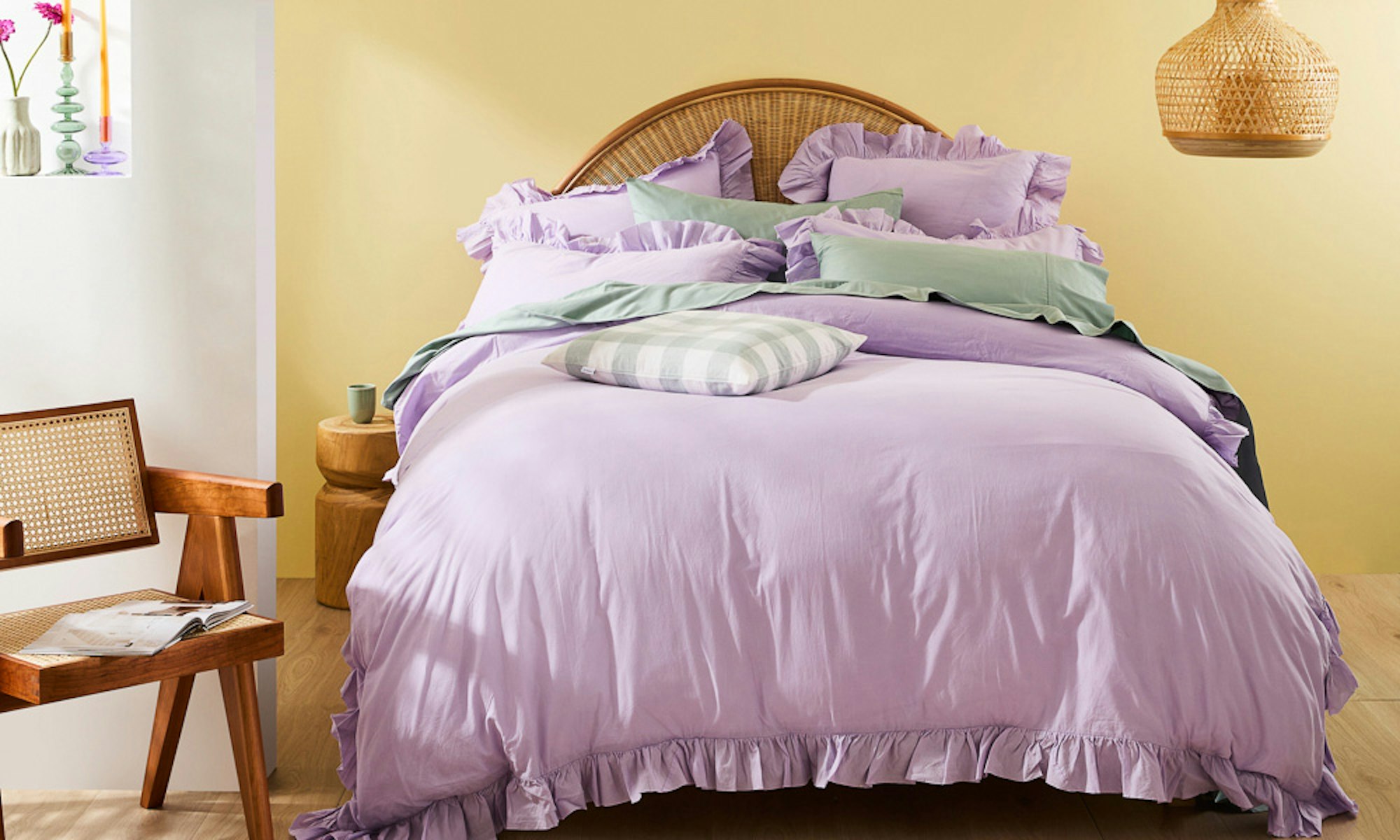 MyHouse SS23 collection. Alice purple ruffle quilt cover set with green sheets and yellow walls