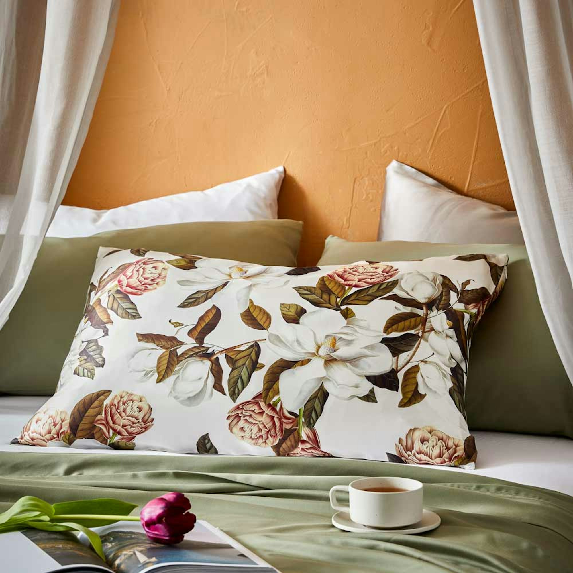 MySilk Silk Pillowcase. Mother's day gift guide 2024. Bed with floral pillowcase and sage green sheets.