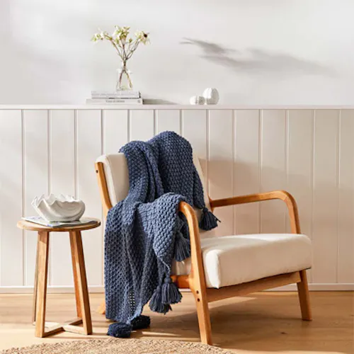 small table with pillows laid on the floor