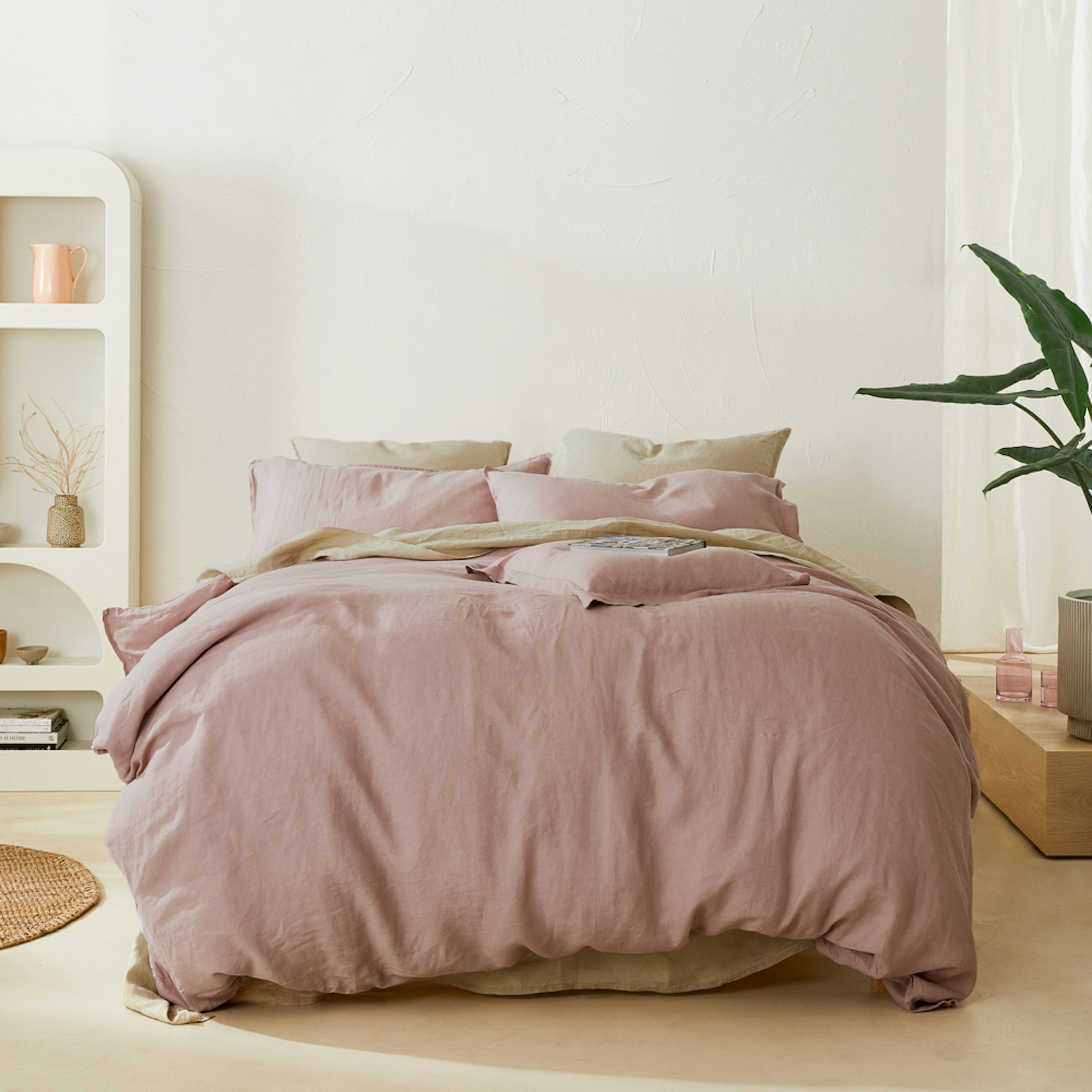 Complete bedroom setting with pink linen quilt cover and natural linen sheets