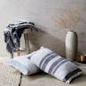 small table with pillows laid on the floor