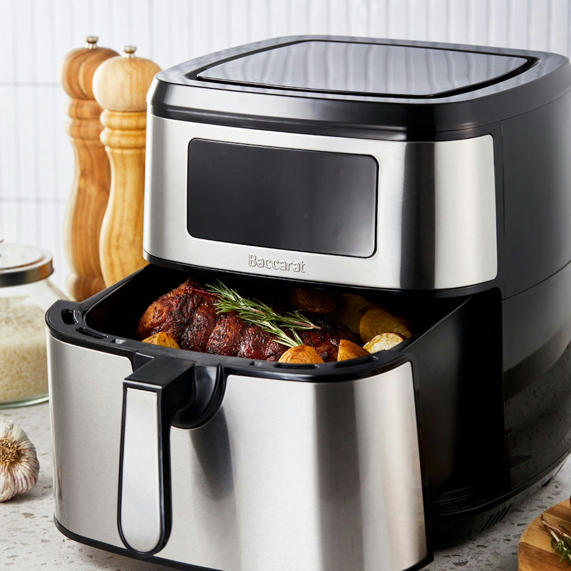 Baccarat Appliances. Baccarat The Healthy Fry 9L Air Fryer with roast on the kitchen bench.