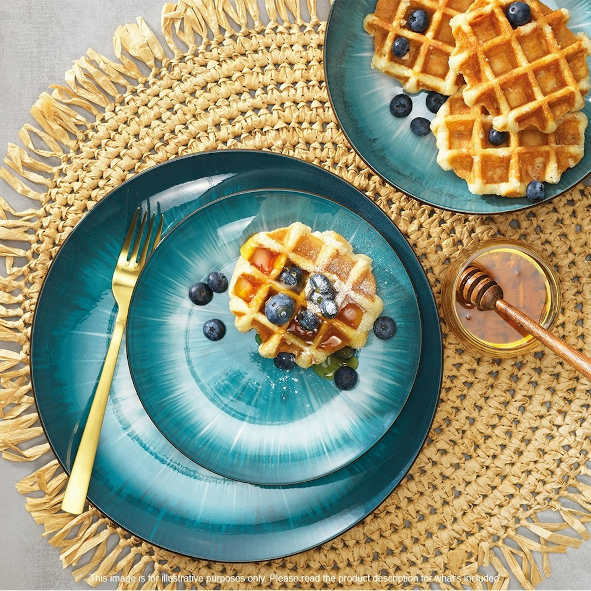 Blue dinner set on rattan placemat with waffles