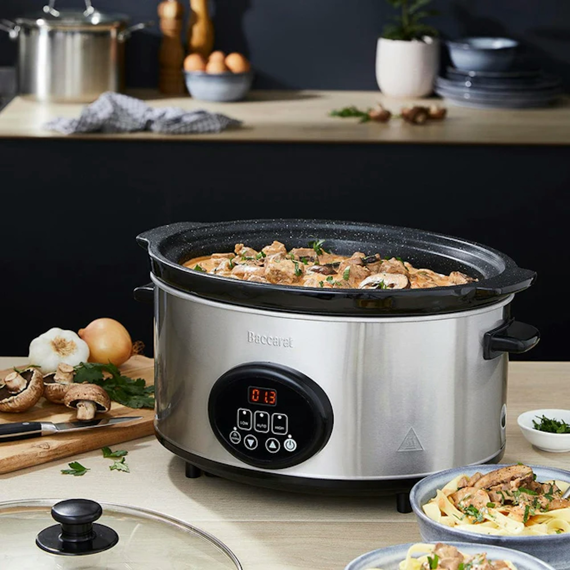 slow cooker on kitchen benchtop