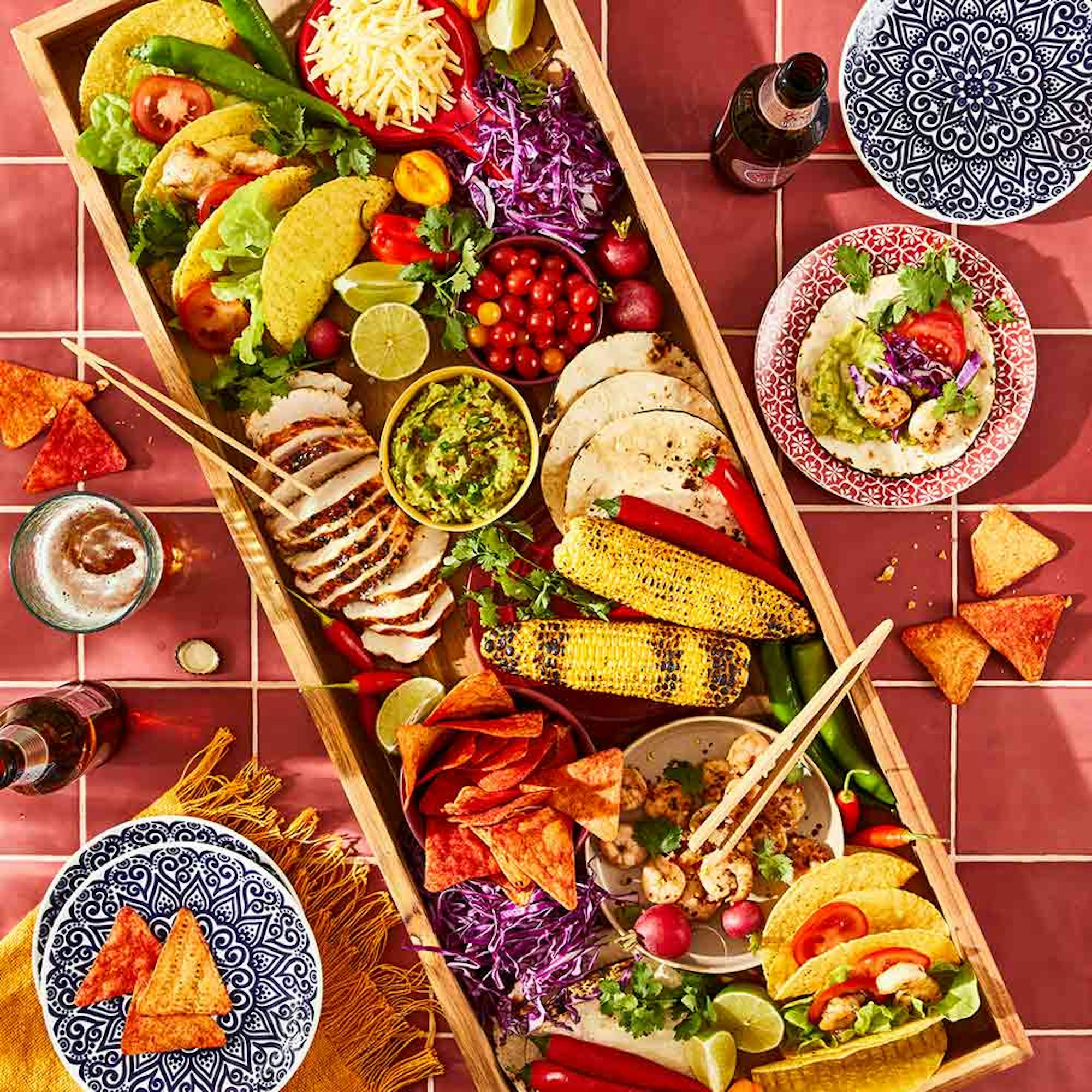 Mexican food platter on red tile table - Perfect Serving Platters for Entertaining