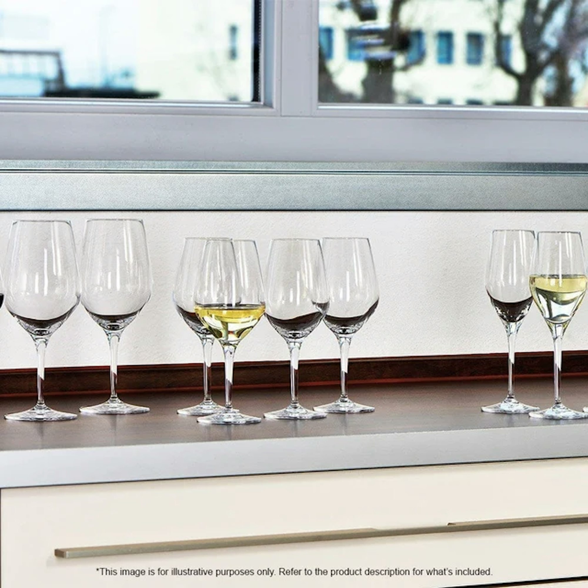 Different wine glasses with various wines placed on bench