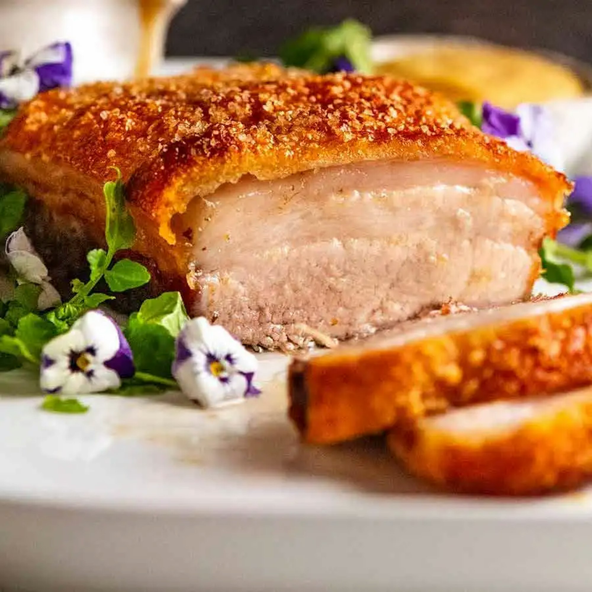 crispy pork belly on a plate