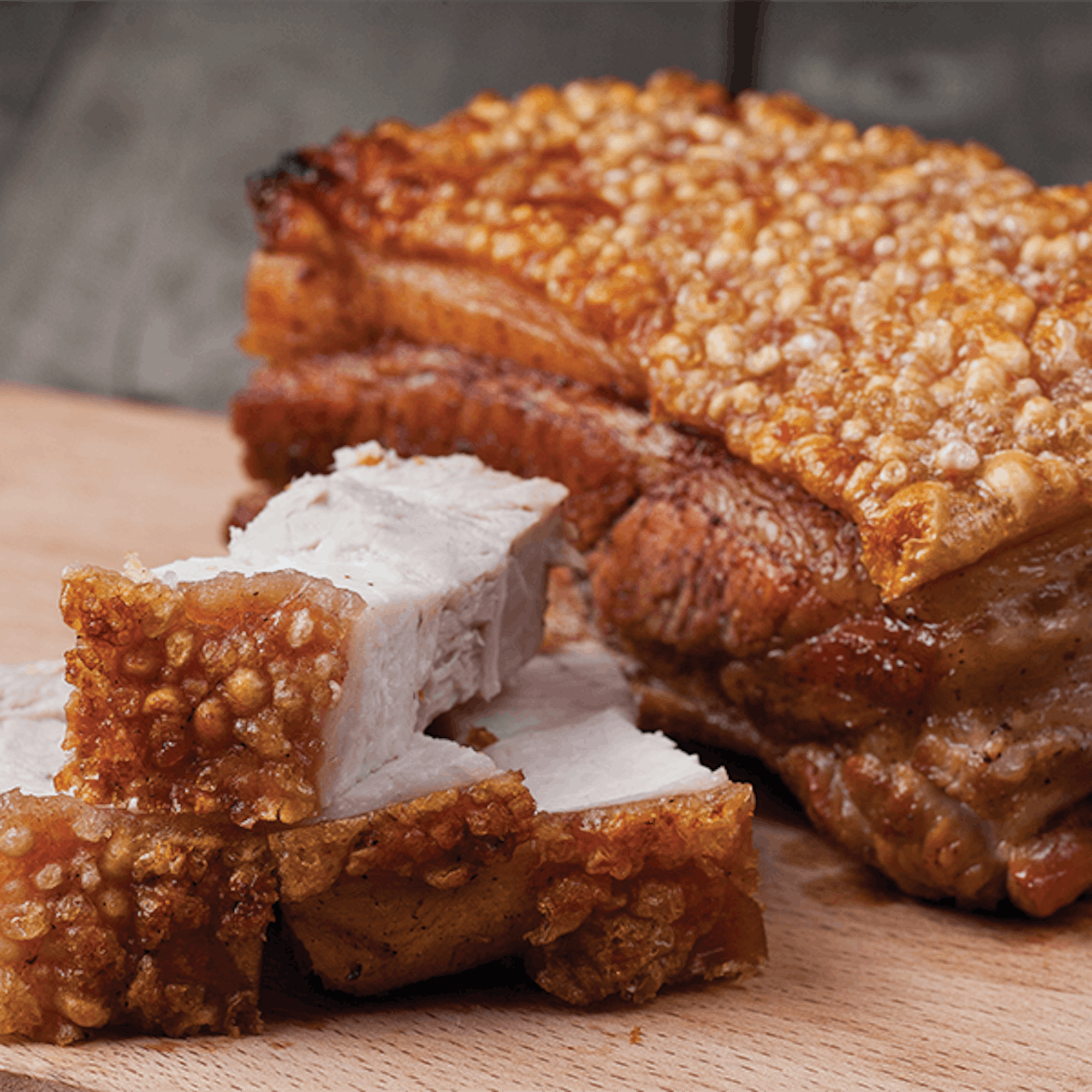 Crispy Roast Pork Belly on kitchen counter cooked with an air fryer