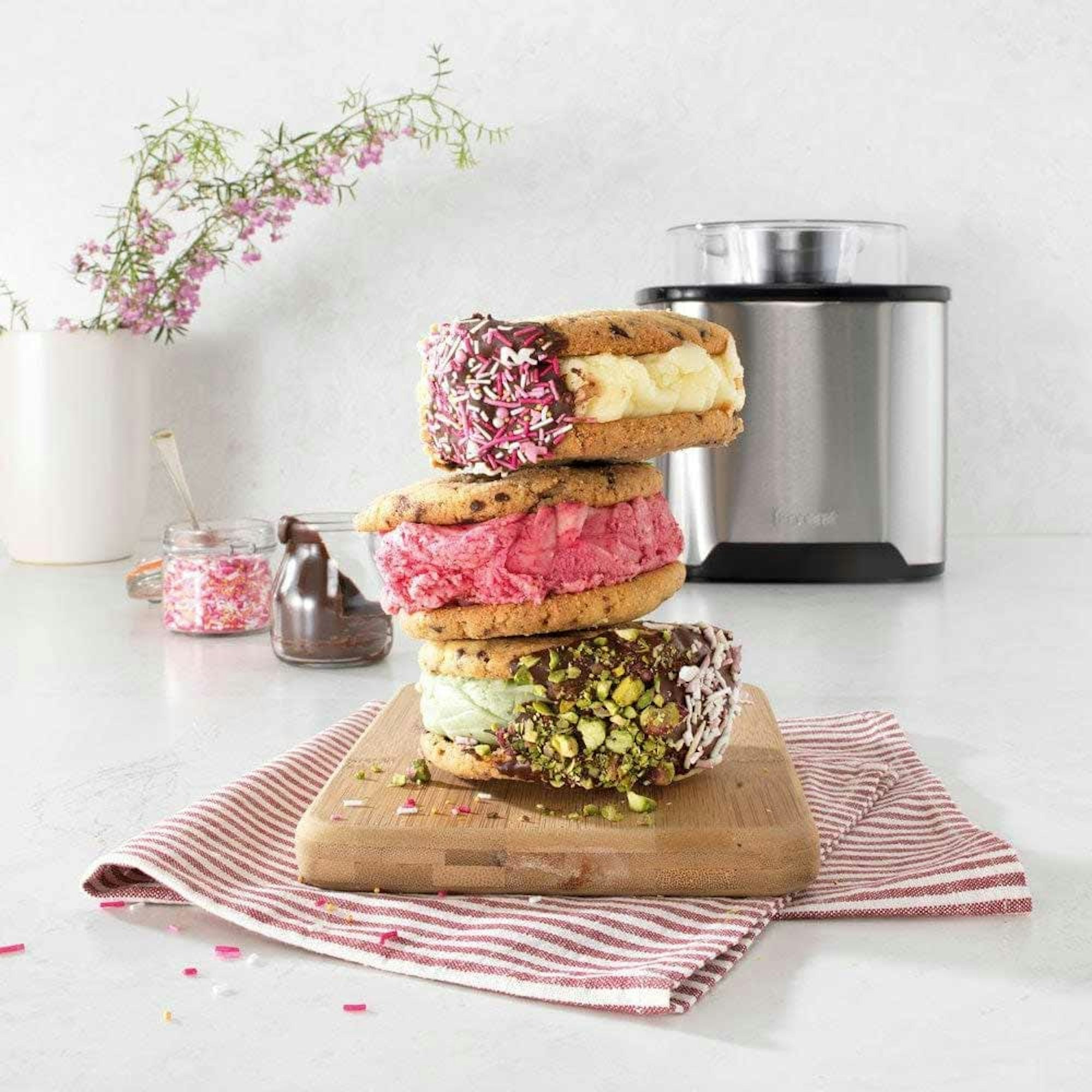 How to Make Summer Desserts at Home? Robins Kitchen Blog. Ice Cream sandwich stack with ice cream maker in the background.