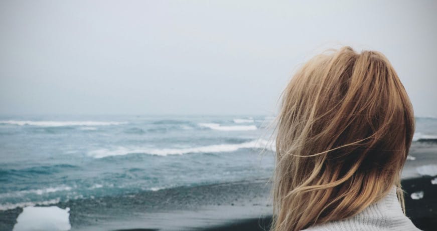 woman looking at the sea