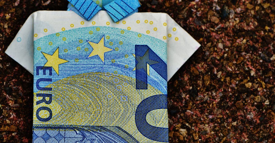 20 euro bill folded into shape of a t-shirt
