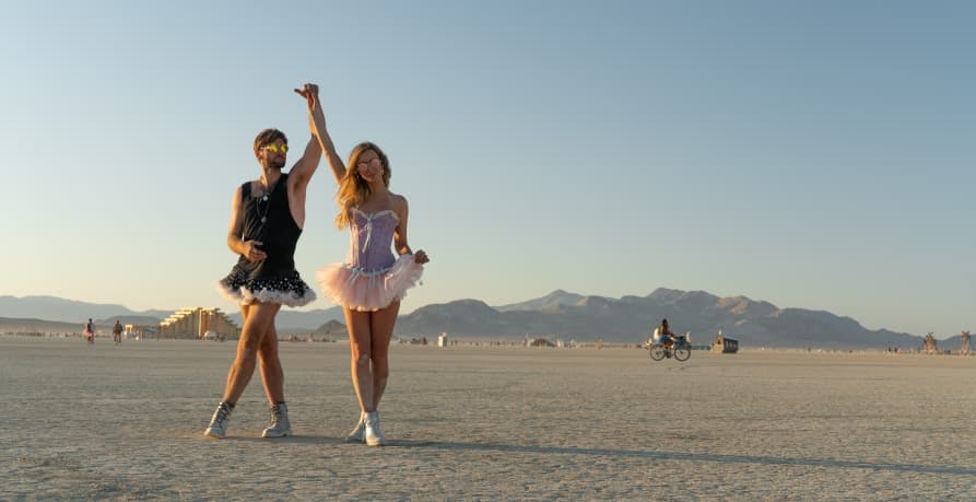 people dressed in costumes for burning man
