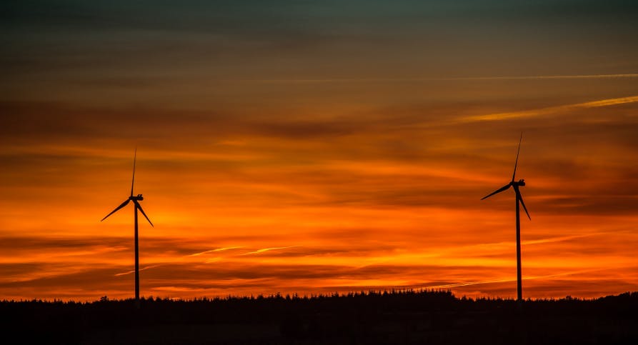 wind turbines in sunset