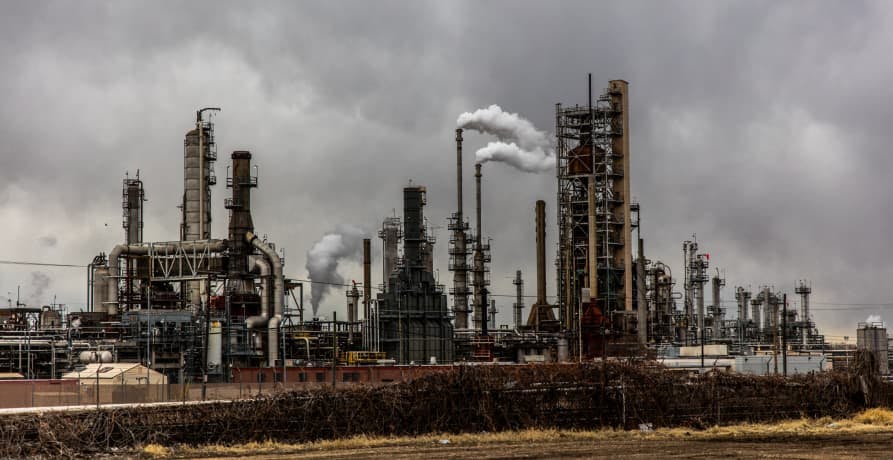 industries polluting cloudy skies