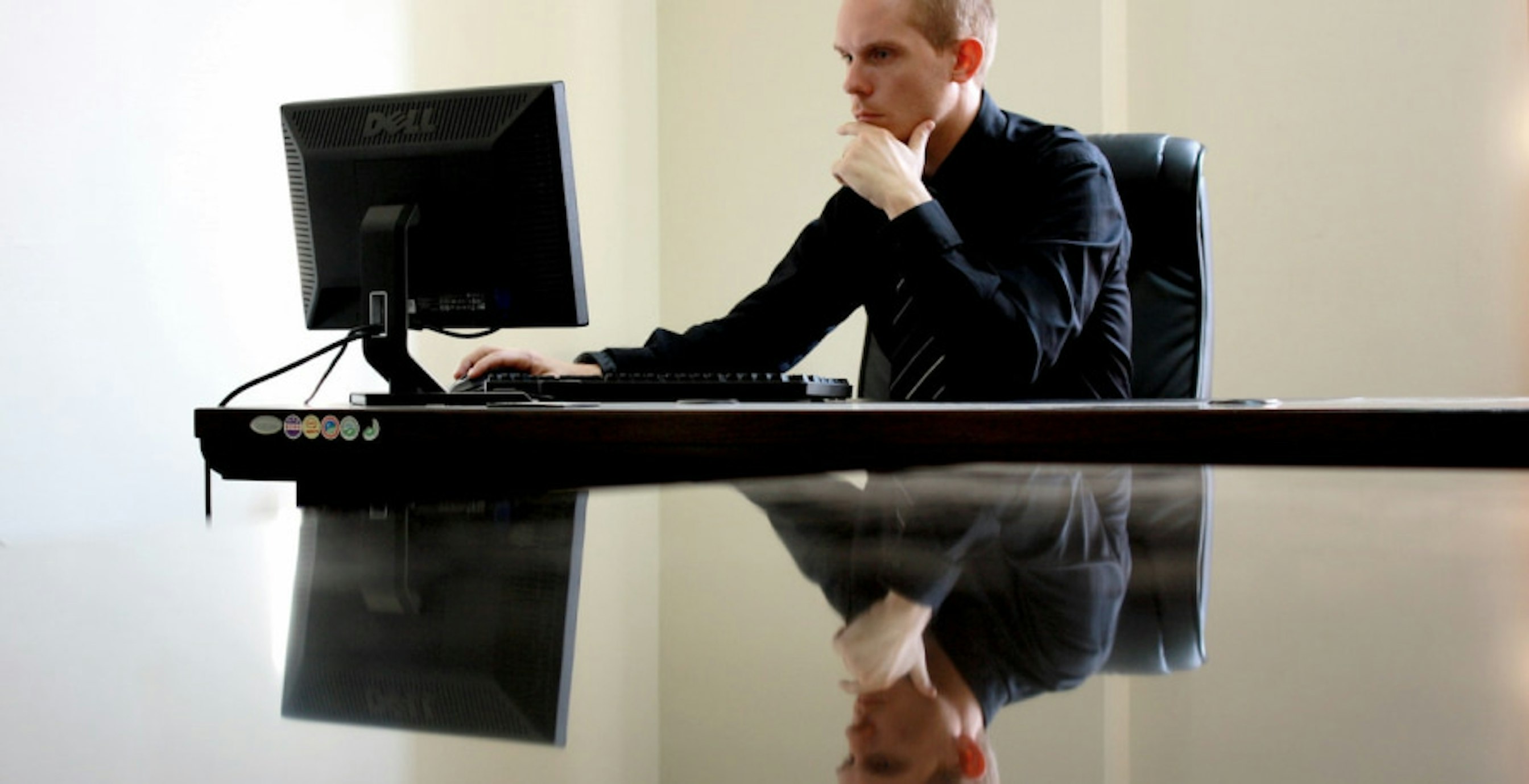 a man who is working on a computer