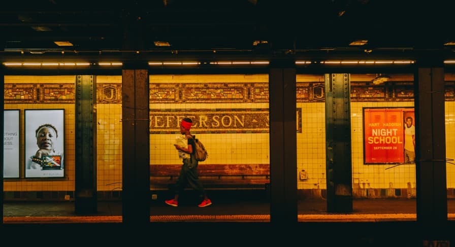 person walking in nyc subway