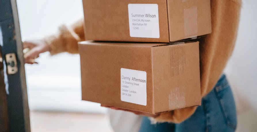 person holding boxes