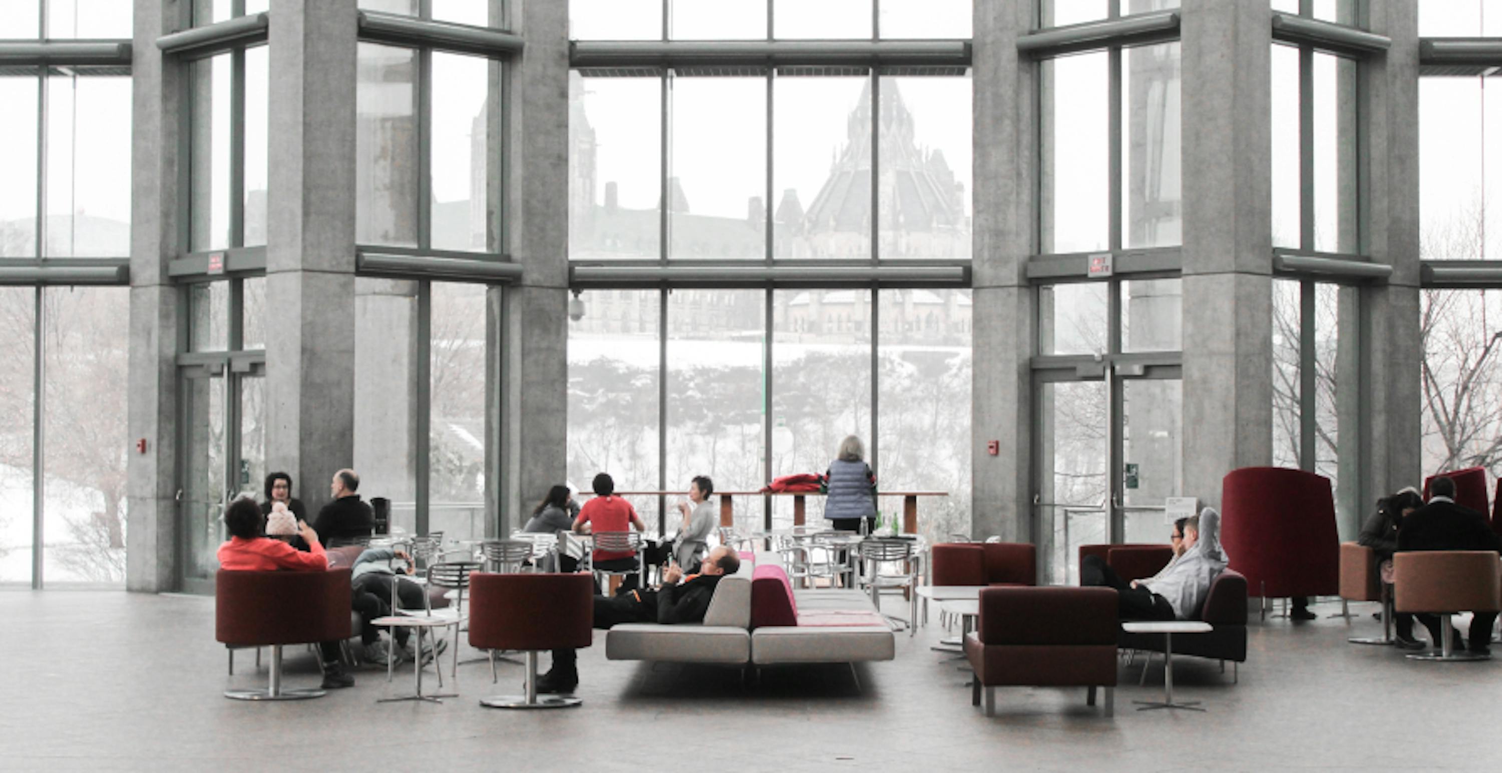 Large open plan office with employees sitting