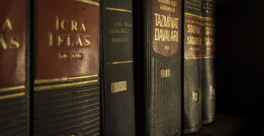 a row of leather bound legal books