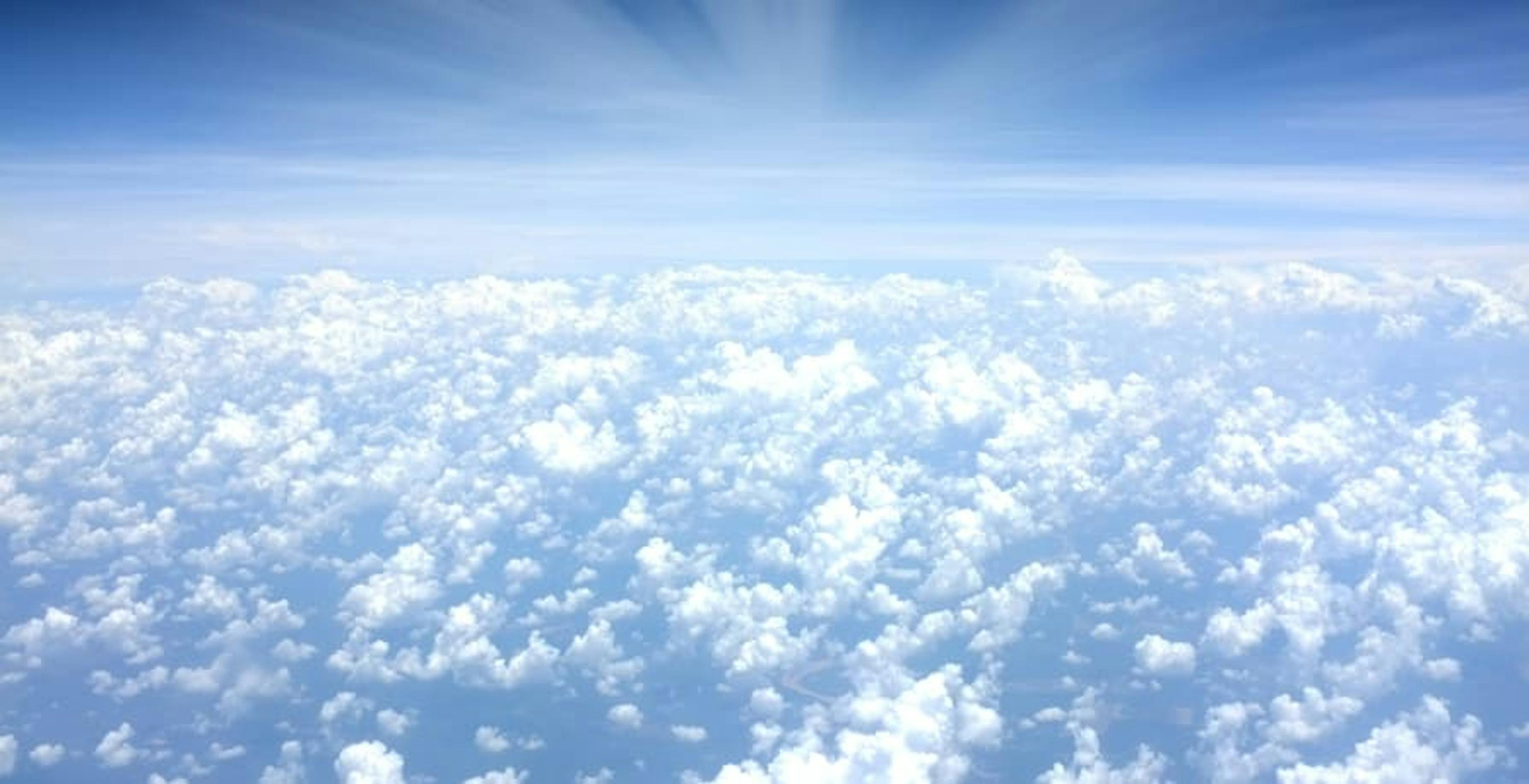 blue sky and puffy clouds