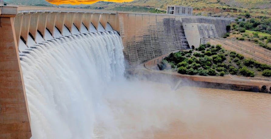 dam with water flowing through it