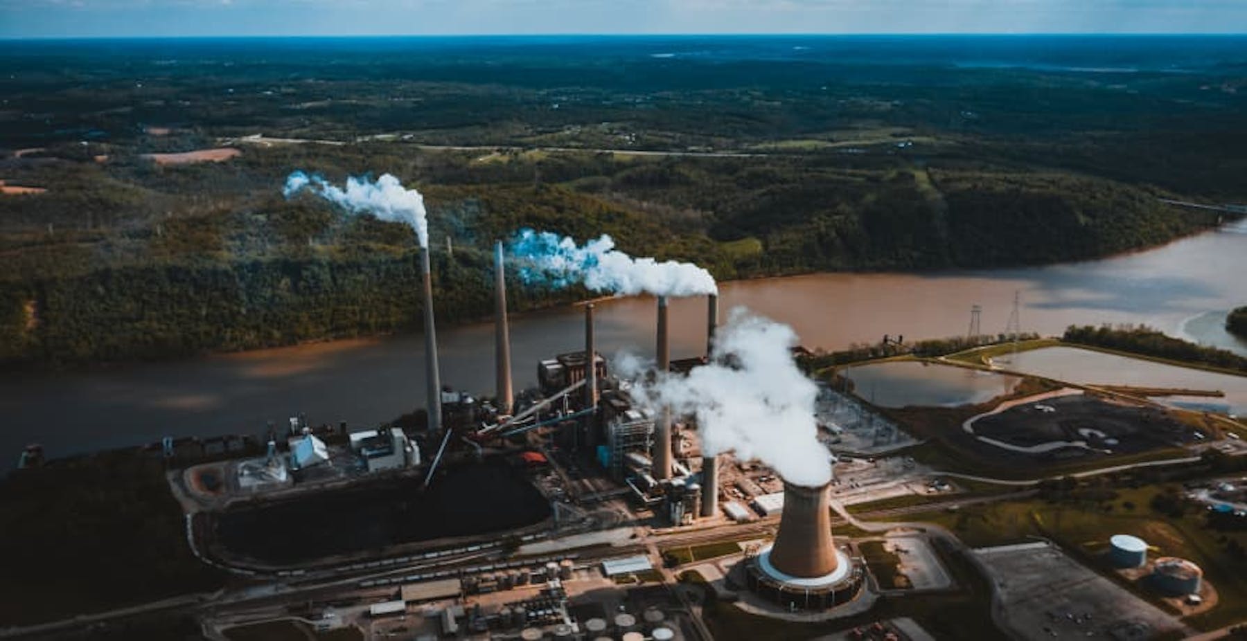 factories producing emissions near river