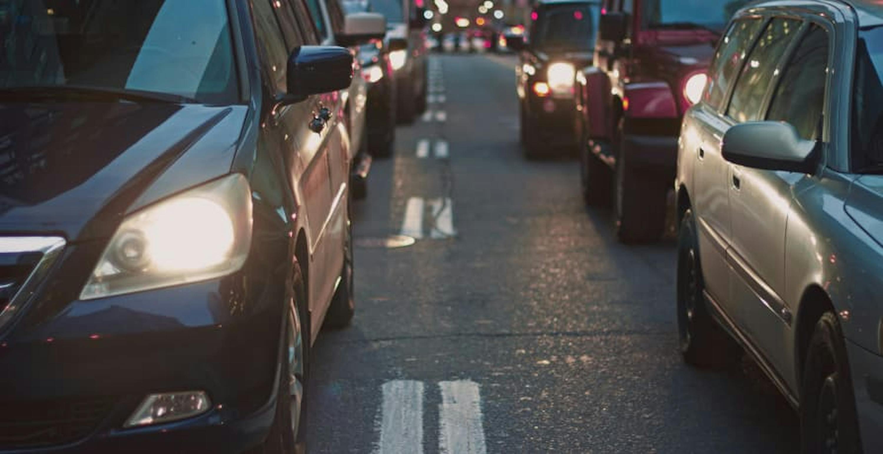 Cars sitting in traffic