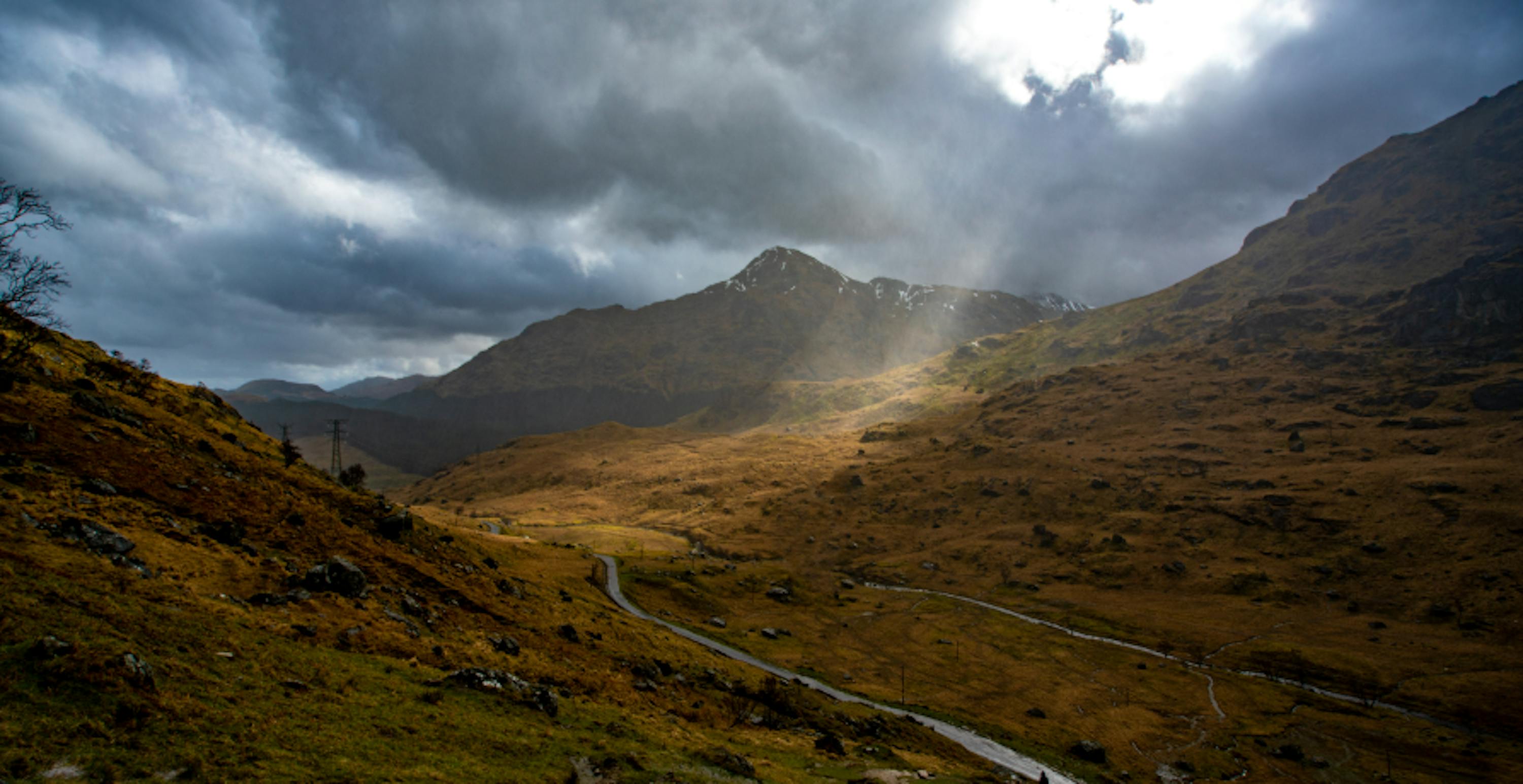 Scottish glen with sunlight shining down