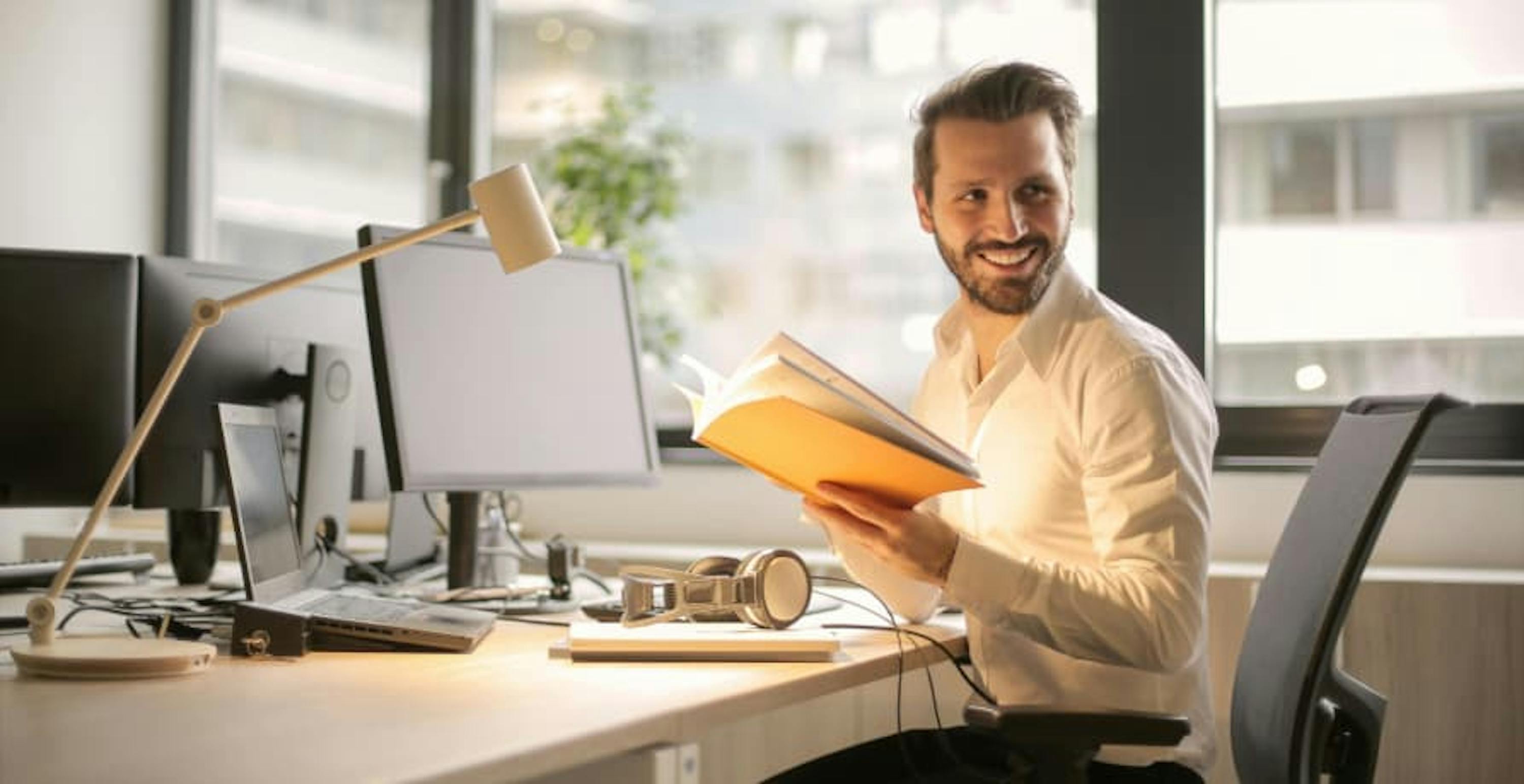 man sitting at office desk