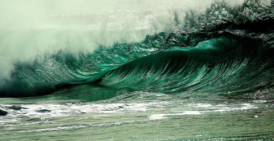 large ocean wave crashing down