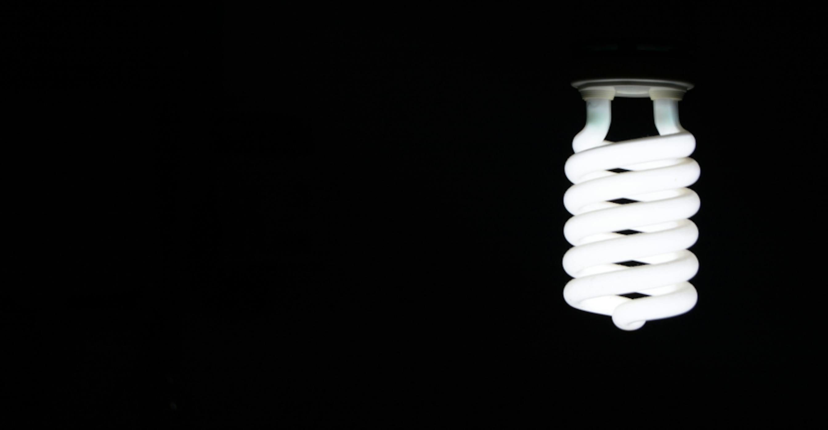 LED lightbulb against black background
