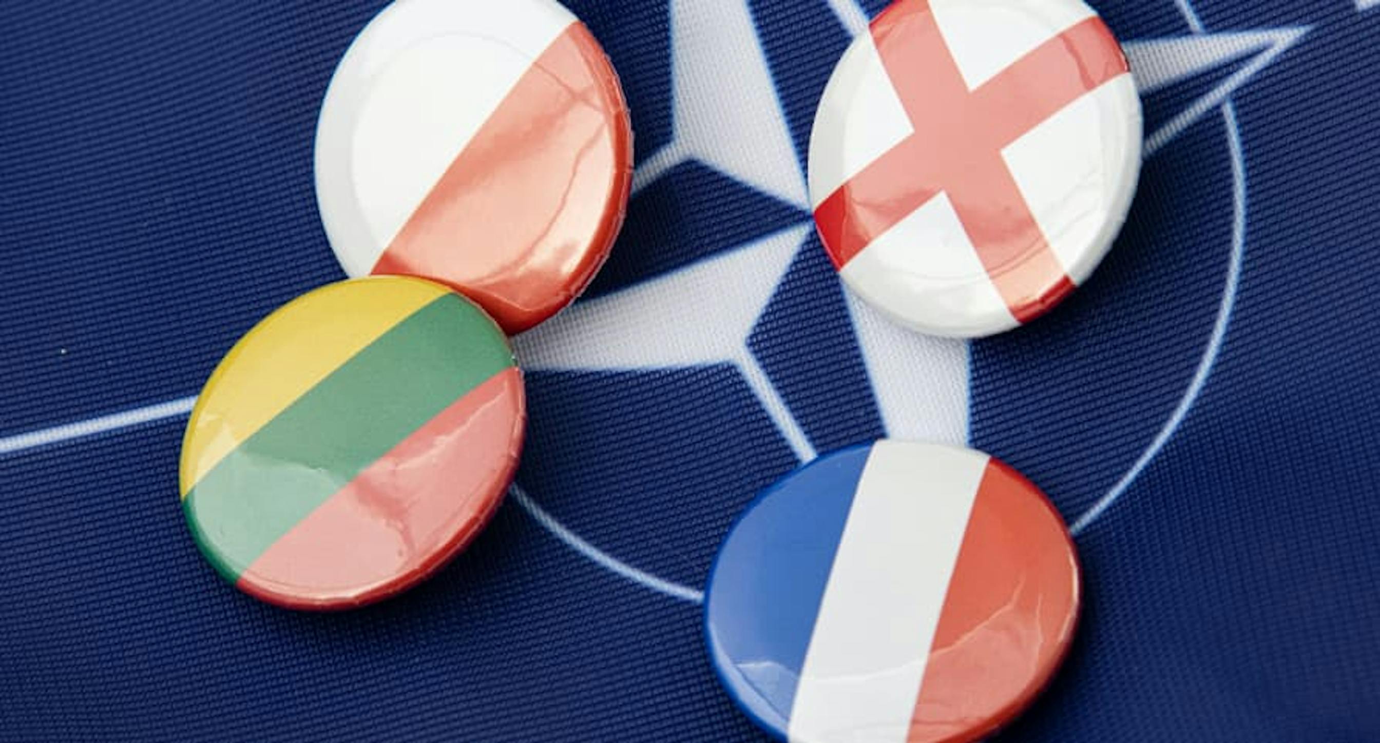 France, Denmark, Lithuania, and Poland pins