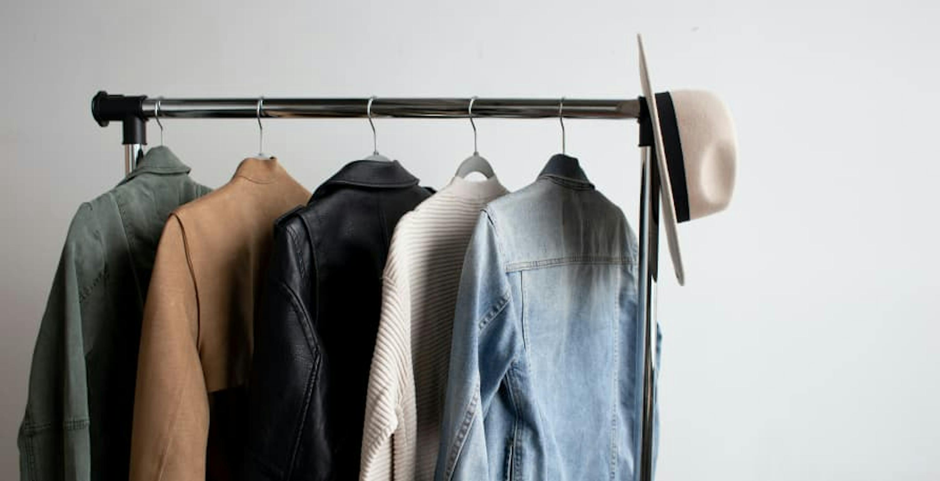 clothes and hat on rack