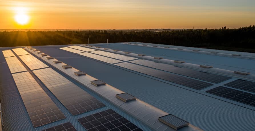 sunset over solar panels