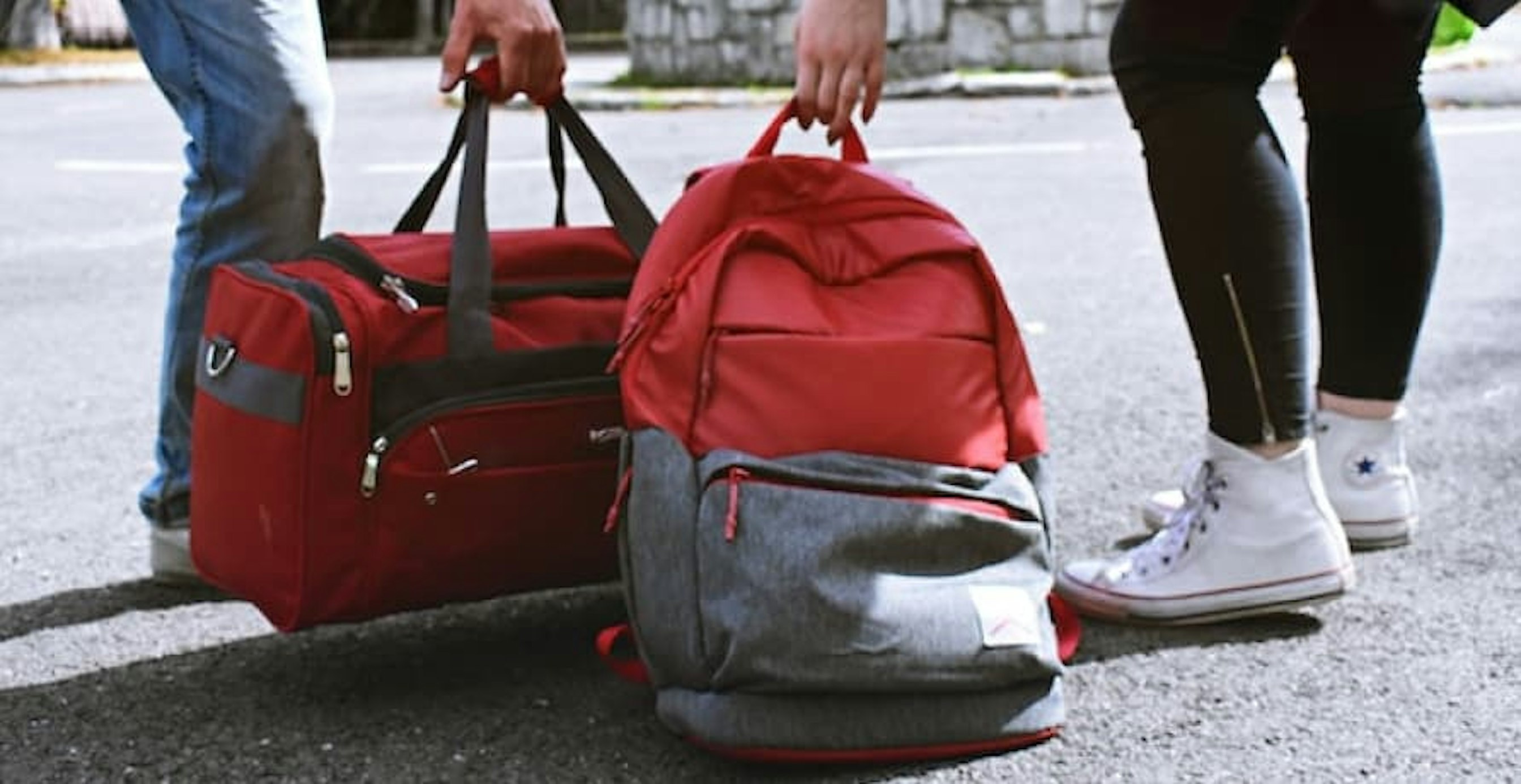 people with their luggage and backpacks