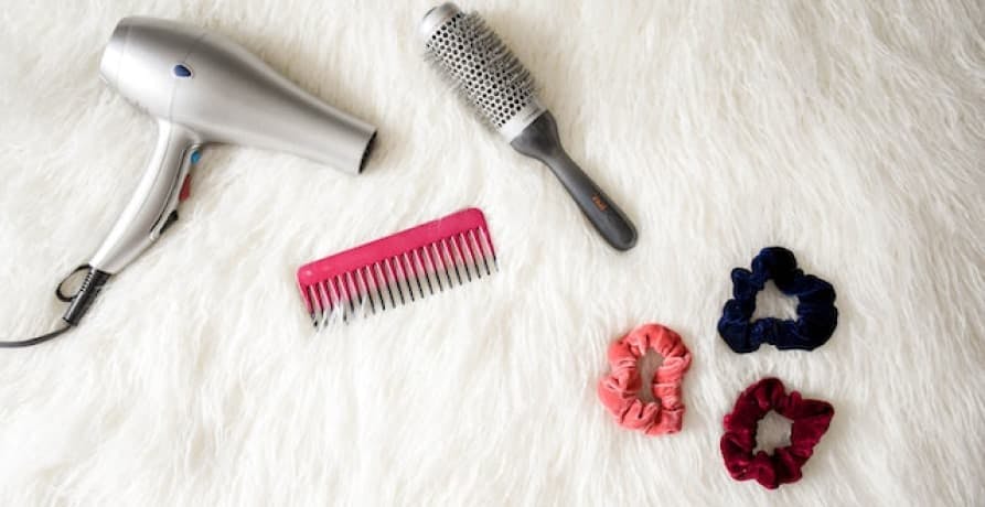 hair dryer, comb, brush, and hair tires