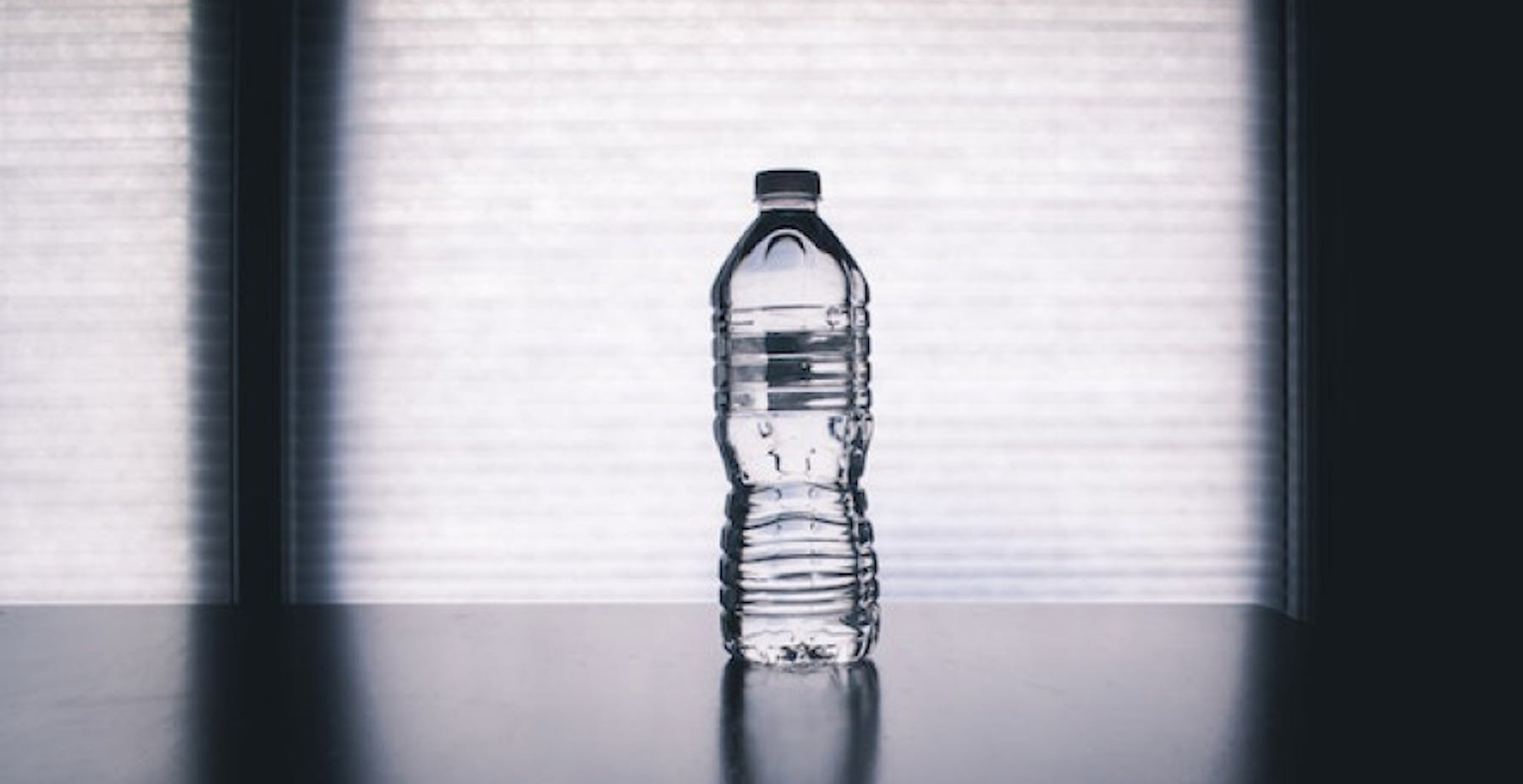 filled up clear plastic water bottle on display