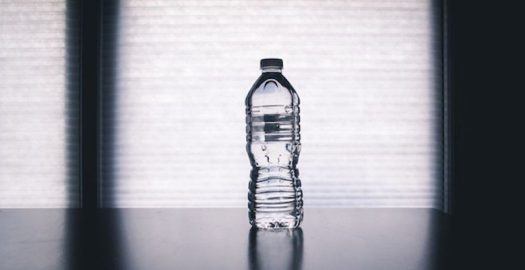 filled up clear plastic water bottle on display