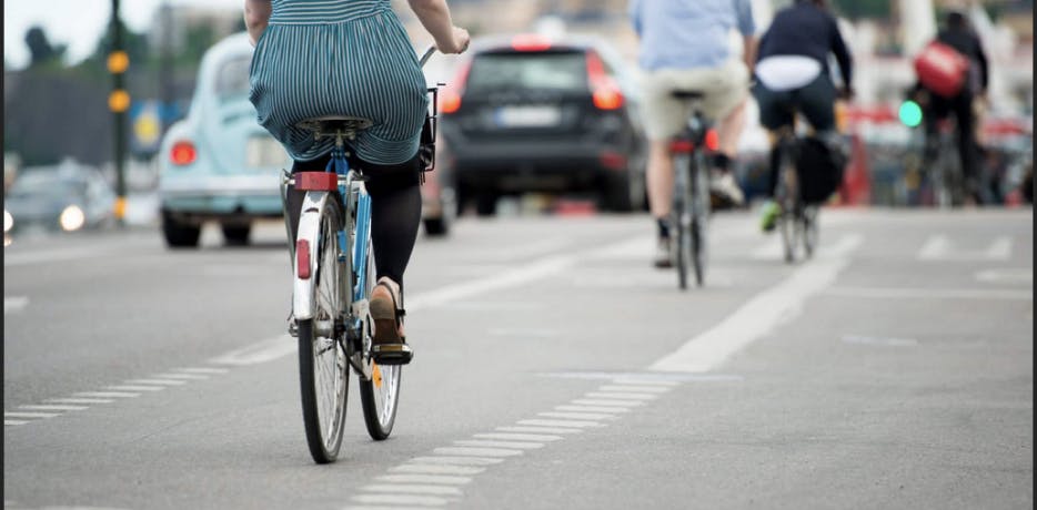 people riding a bike