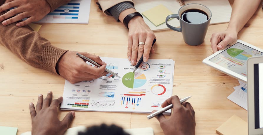 employees strategising over data