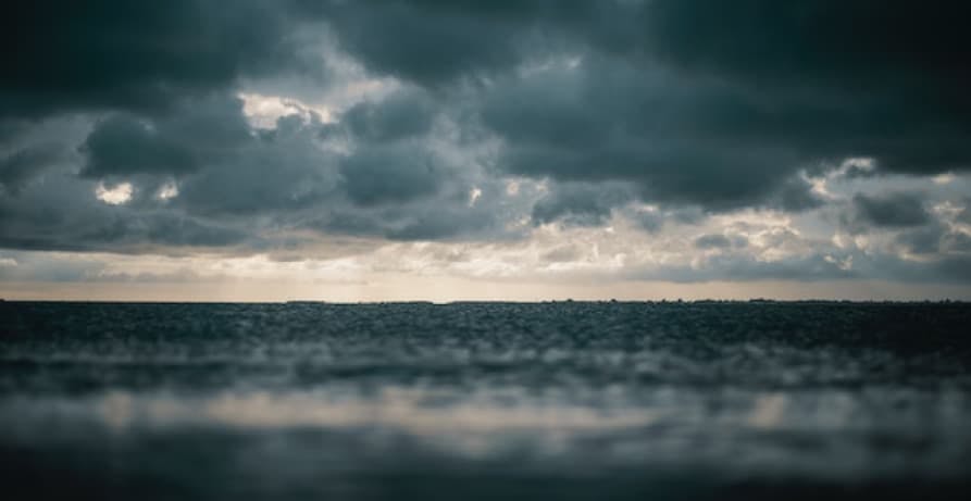 storm happening grey clouds over ocean