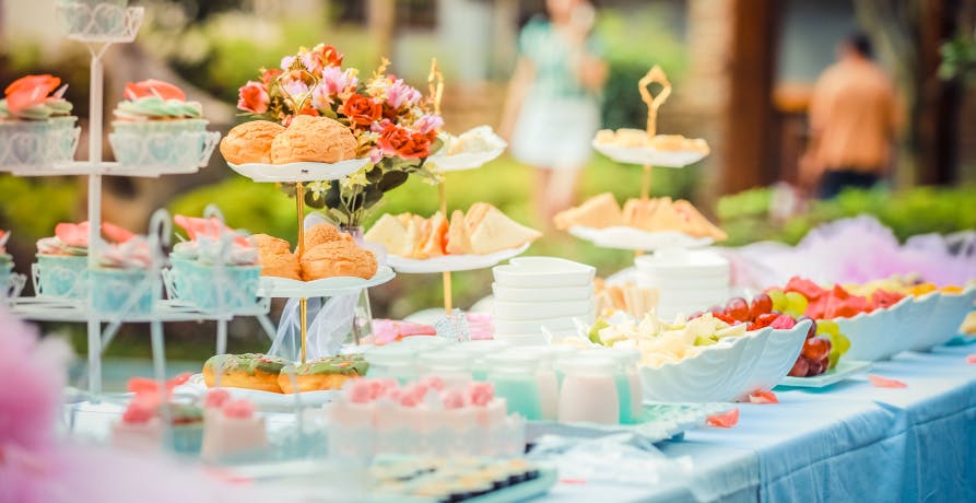cake stands and food on table