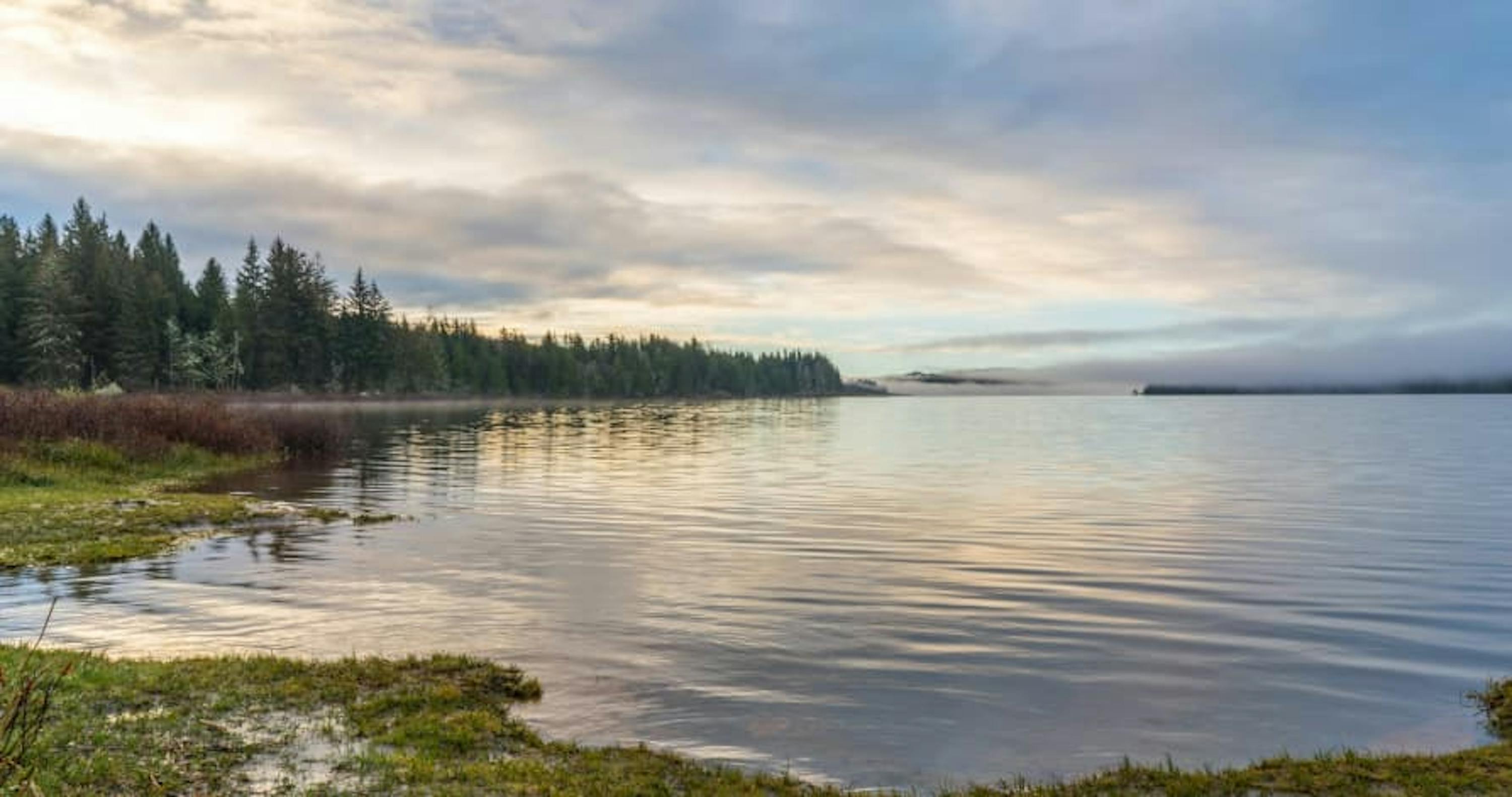 view of lake approaching sunset