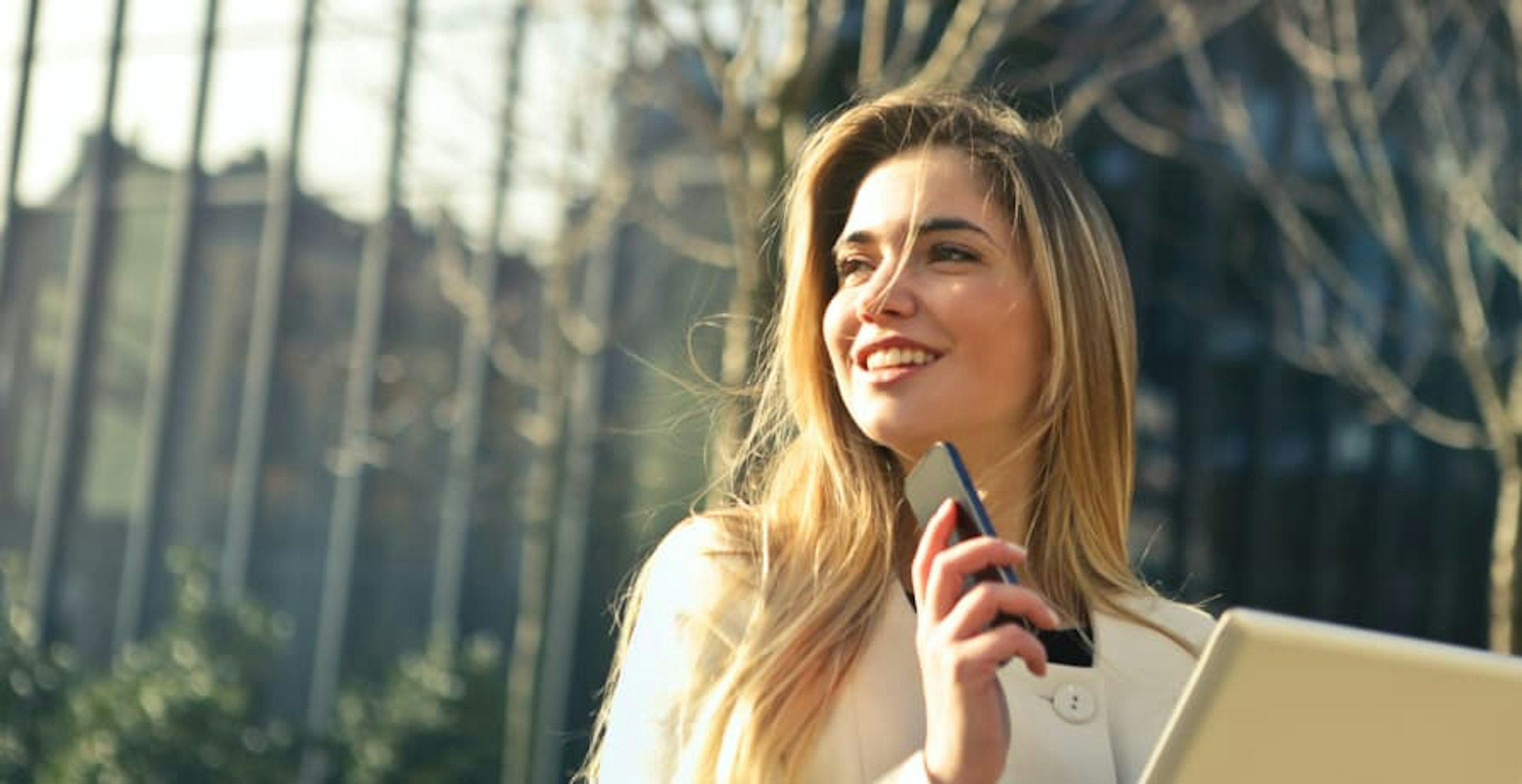 woman holding a mobile phone