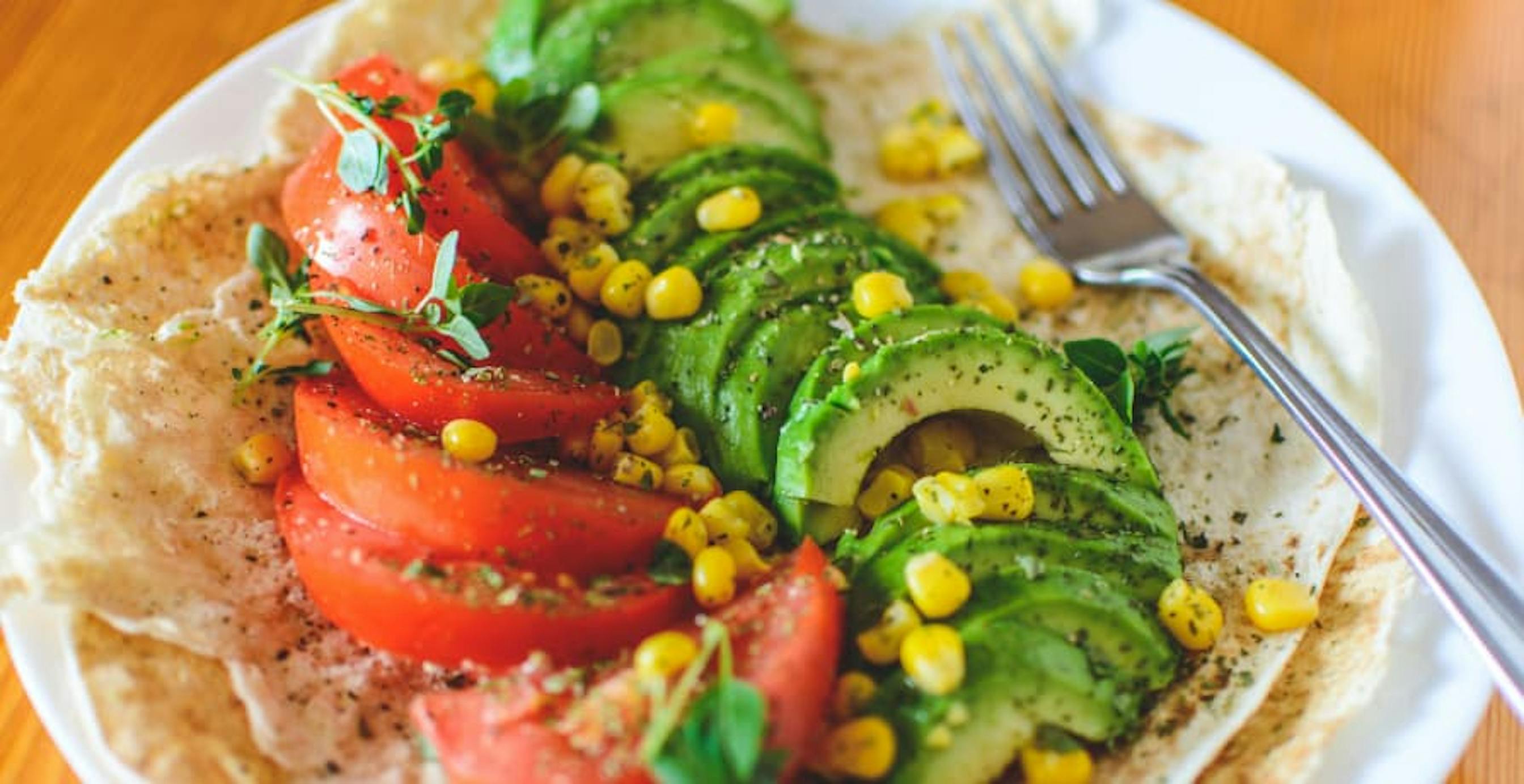 tortillas with avocado tomato corn