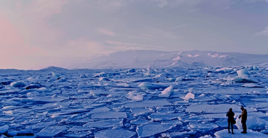 people standing on broken ice