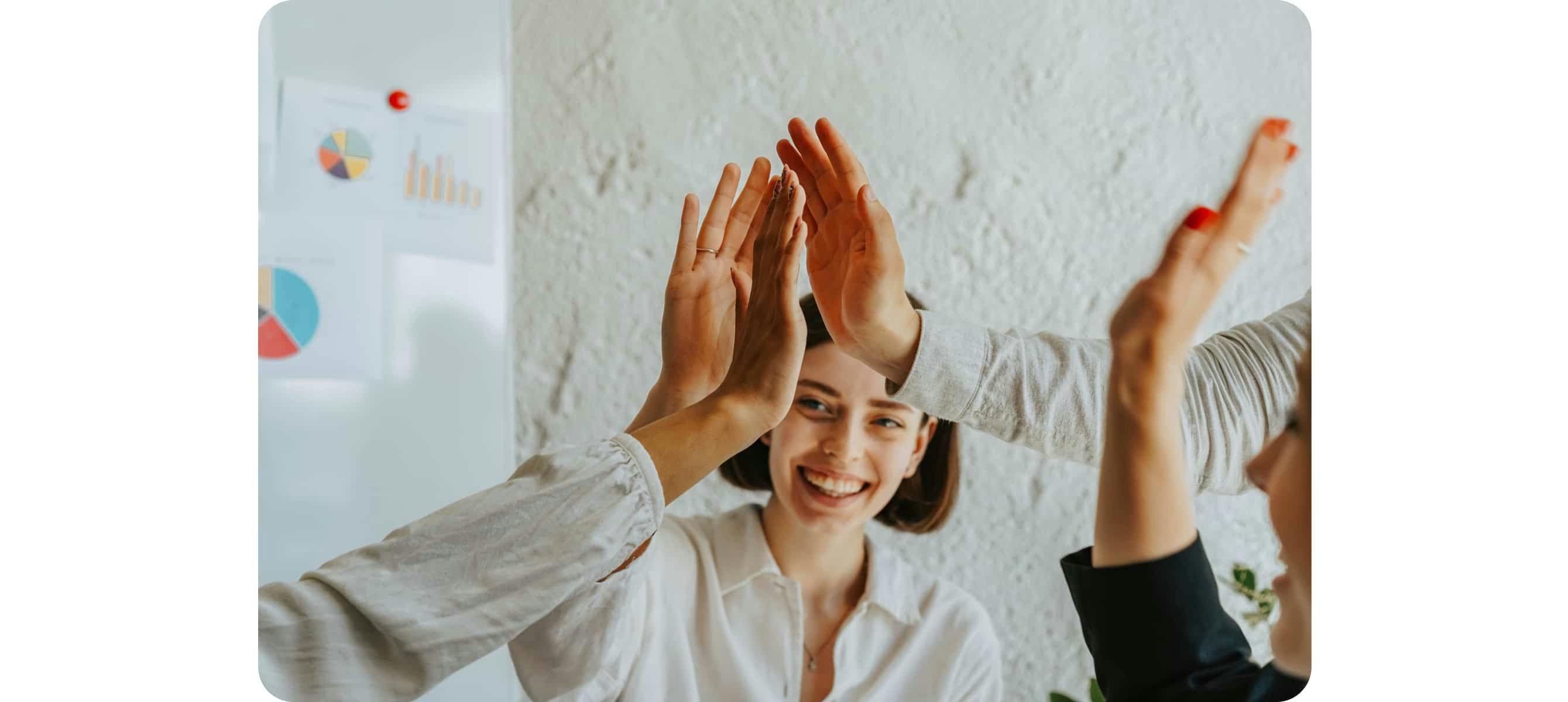 Group of people doing high five