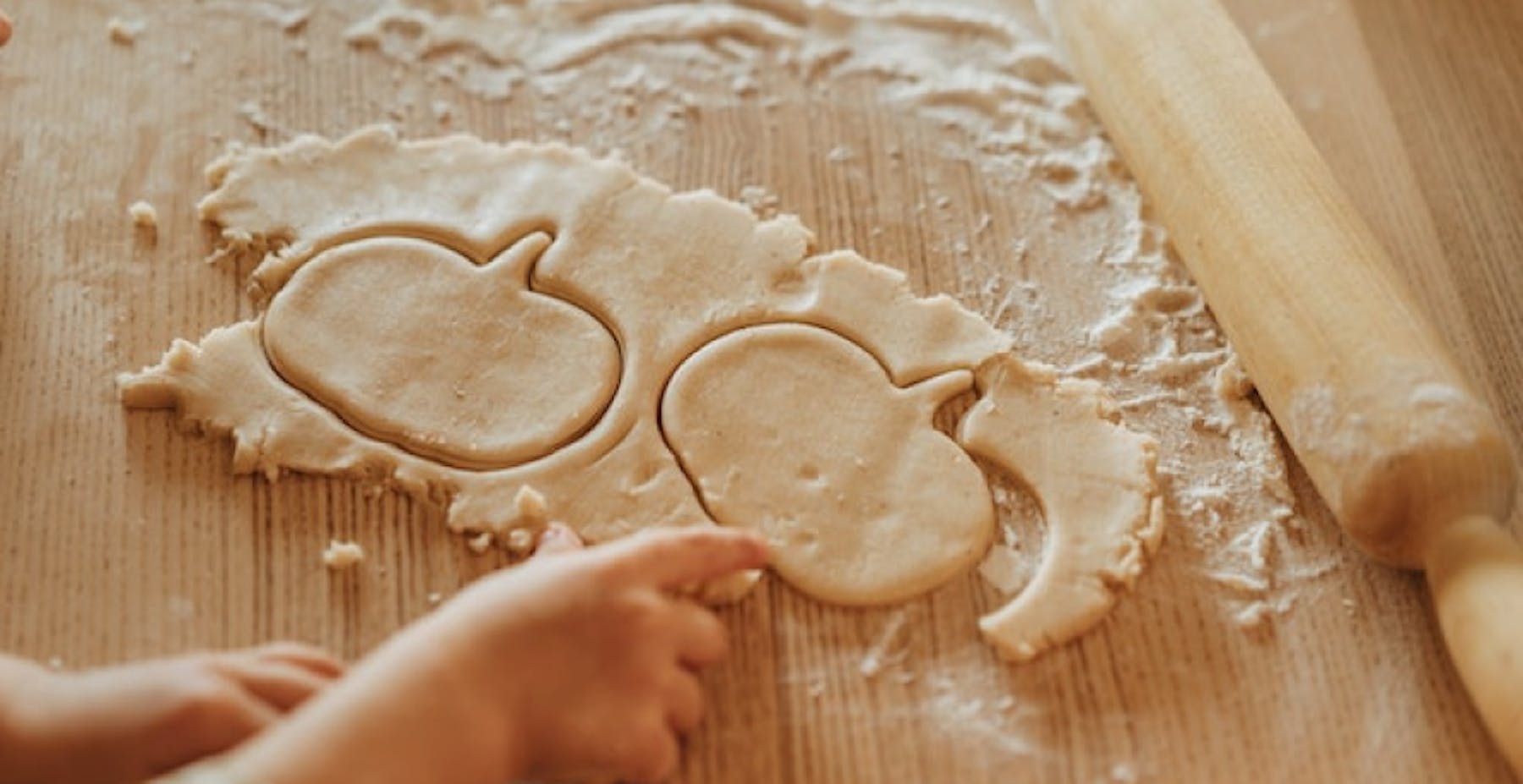 making pumpkin shaped cookie dough